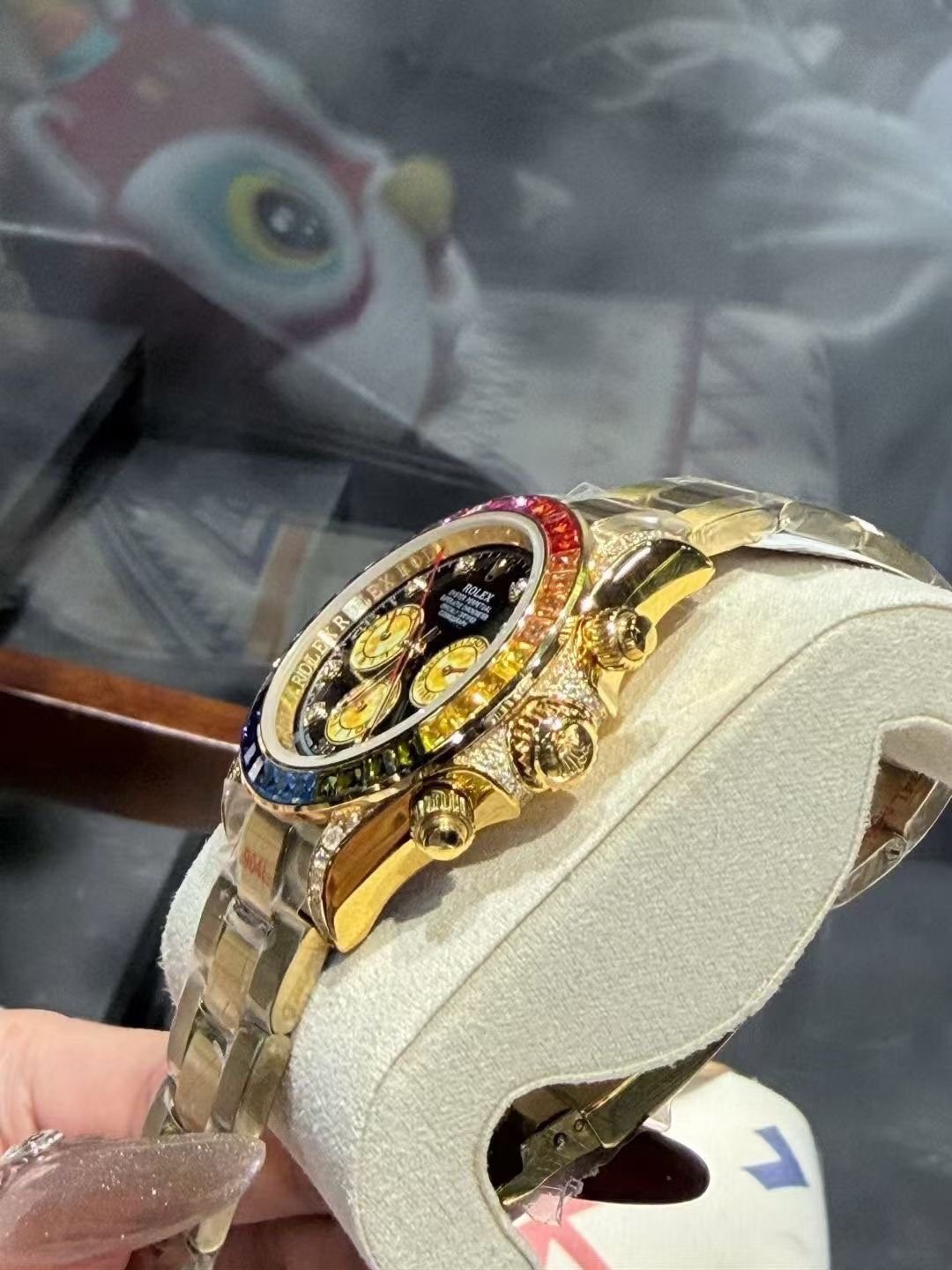 Rolex Rainbow Gemstone Chronograph Watch — side