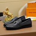 Louis Vuitton Black Textured Loafers — hero
