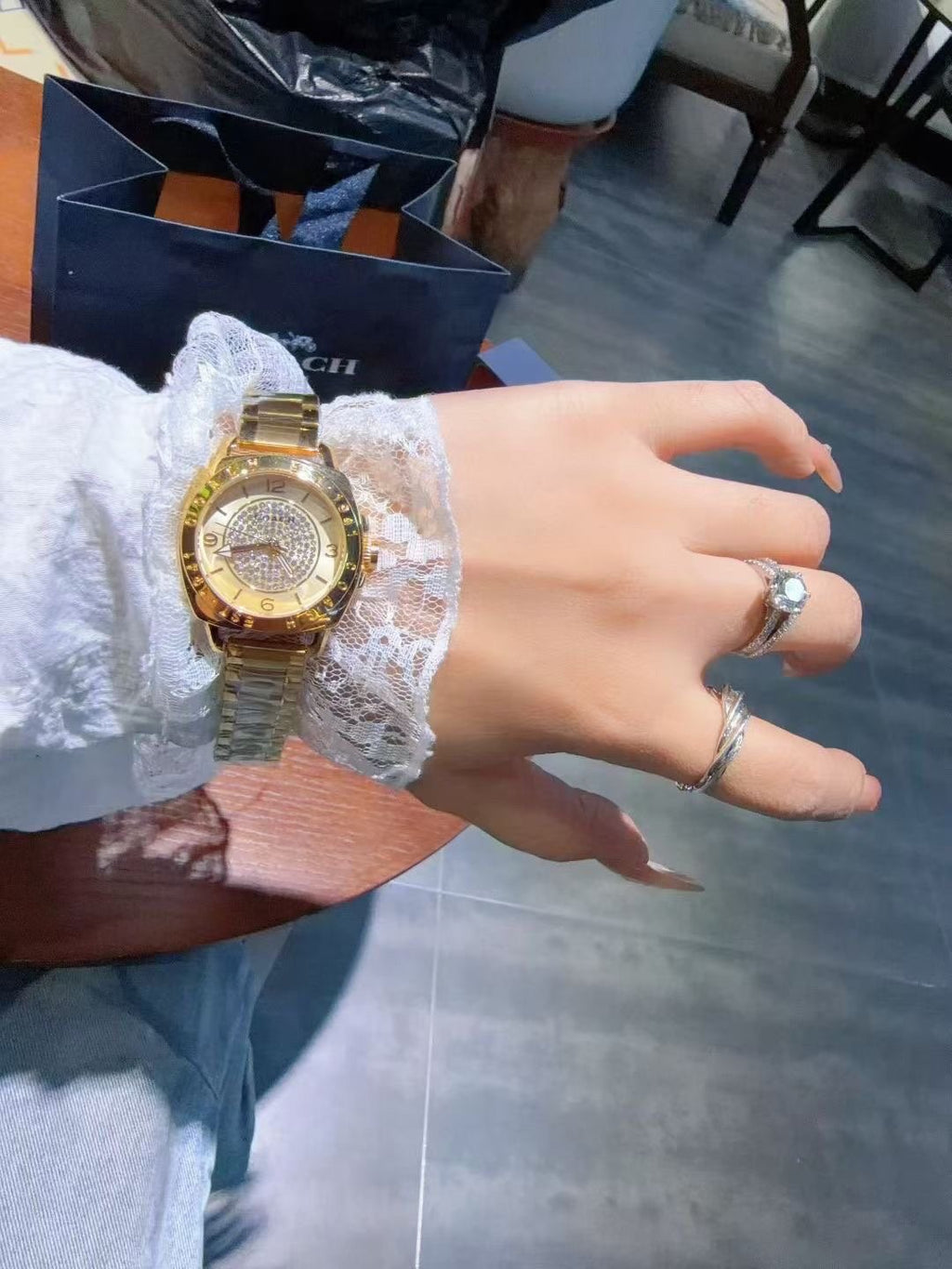 Coach Gold-Tone Crystal Bezel Watch — model