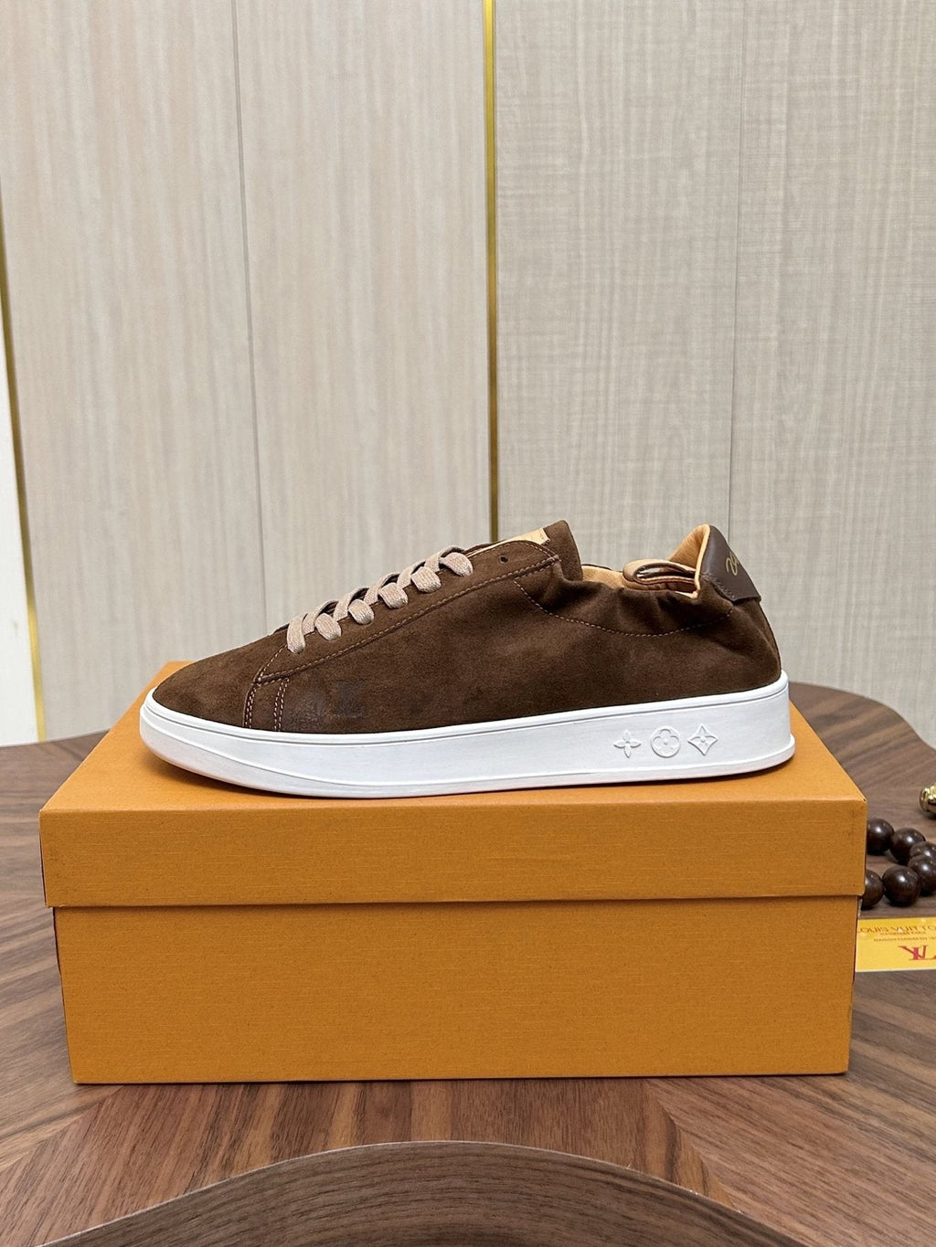 Louis Vuitton Brown Textured Low-Top Sneakers — side