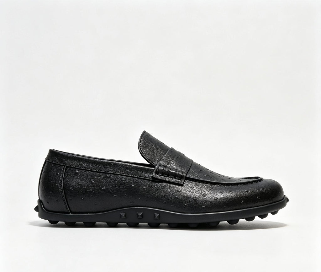 Hermès Textured Studded-Sole Loafers — side